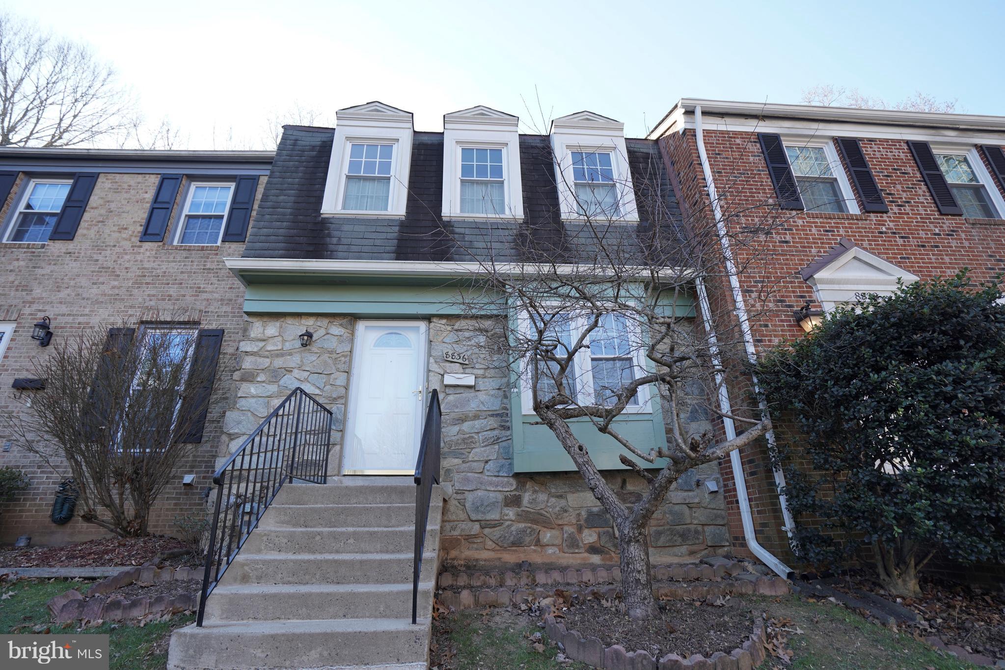 8836 Surveyors Place Springfield, VA 22152 - Photo 2 of 48 a front view of a house