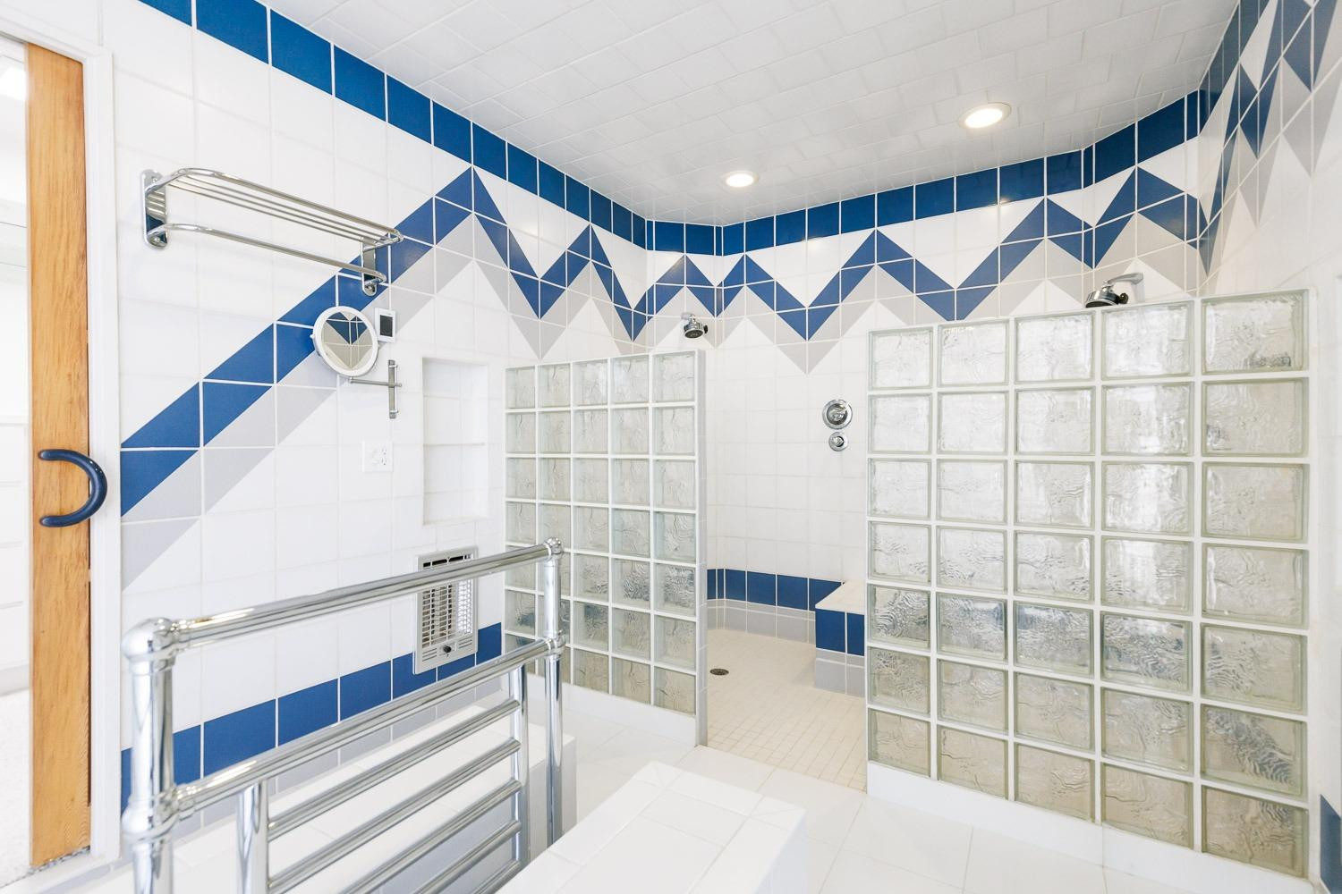 4603 94th Street Lubbock, TX 79424 - Photo 15 of 46 a bathroom with a bathtub and a shower