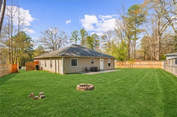 a house view with a garden space