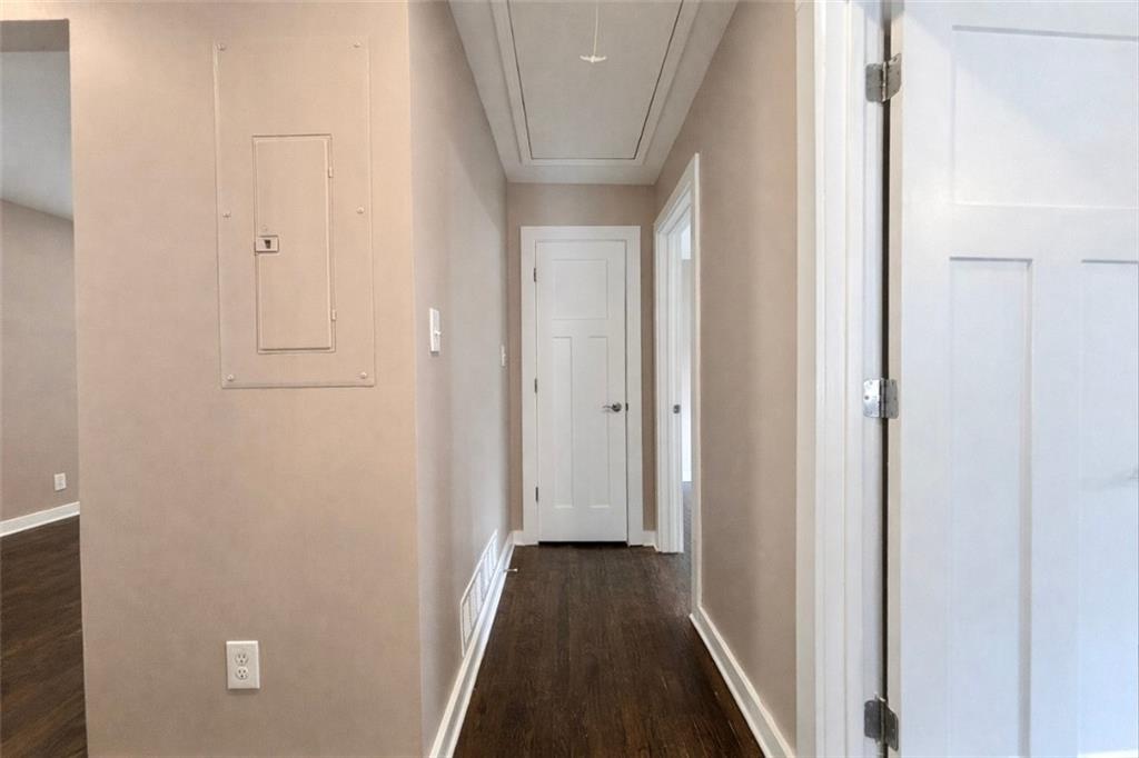 1291 Lorenzo Drive Southwest Atlanta, GA 30310 - Photo 14 of 20 a view of a hallway with wooden floor