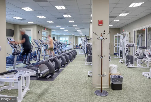 a view of balcony with wooden floor and fence