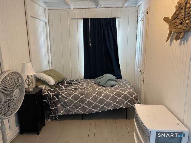 855 East Broadway Milford, CT 06460 - Photo 17 of 19 a bedroom with a bed and a window