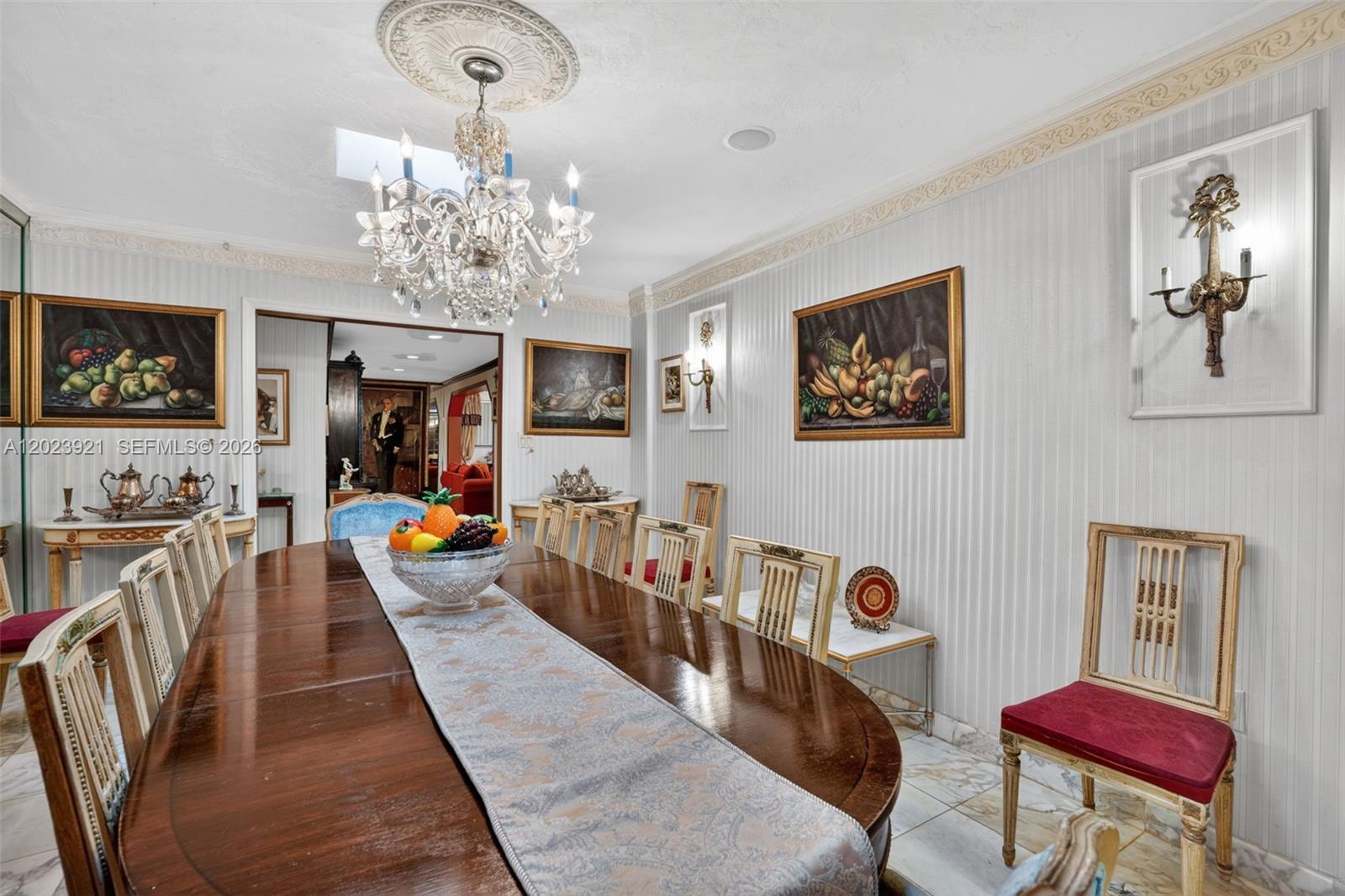 8461 Southwest 68th St Road Miami, FL 33143 - Photo 51 of 65 a living room with furniture and a chandelier