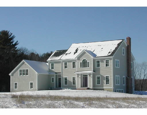 642 Main Street Boxford, MA 01921 - Photo 1 of 7 a front view of a house with a yard