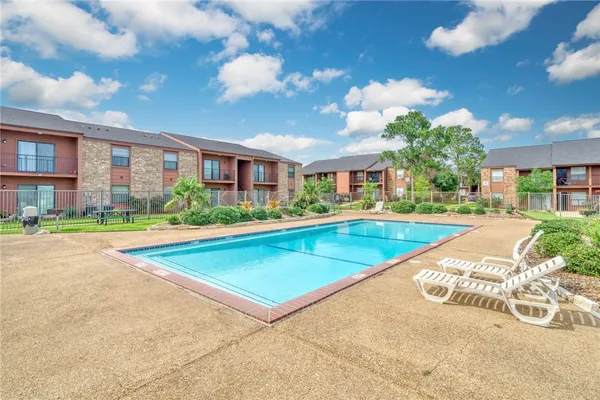 a view of outdoor space yard swimming pool and porch