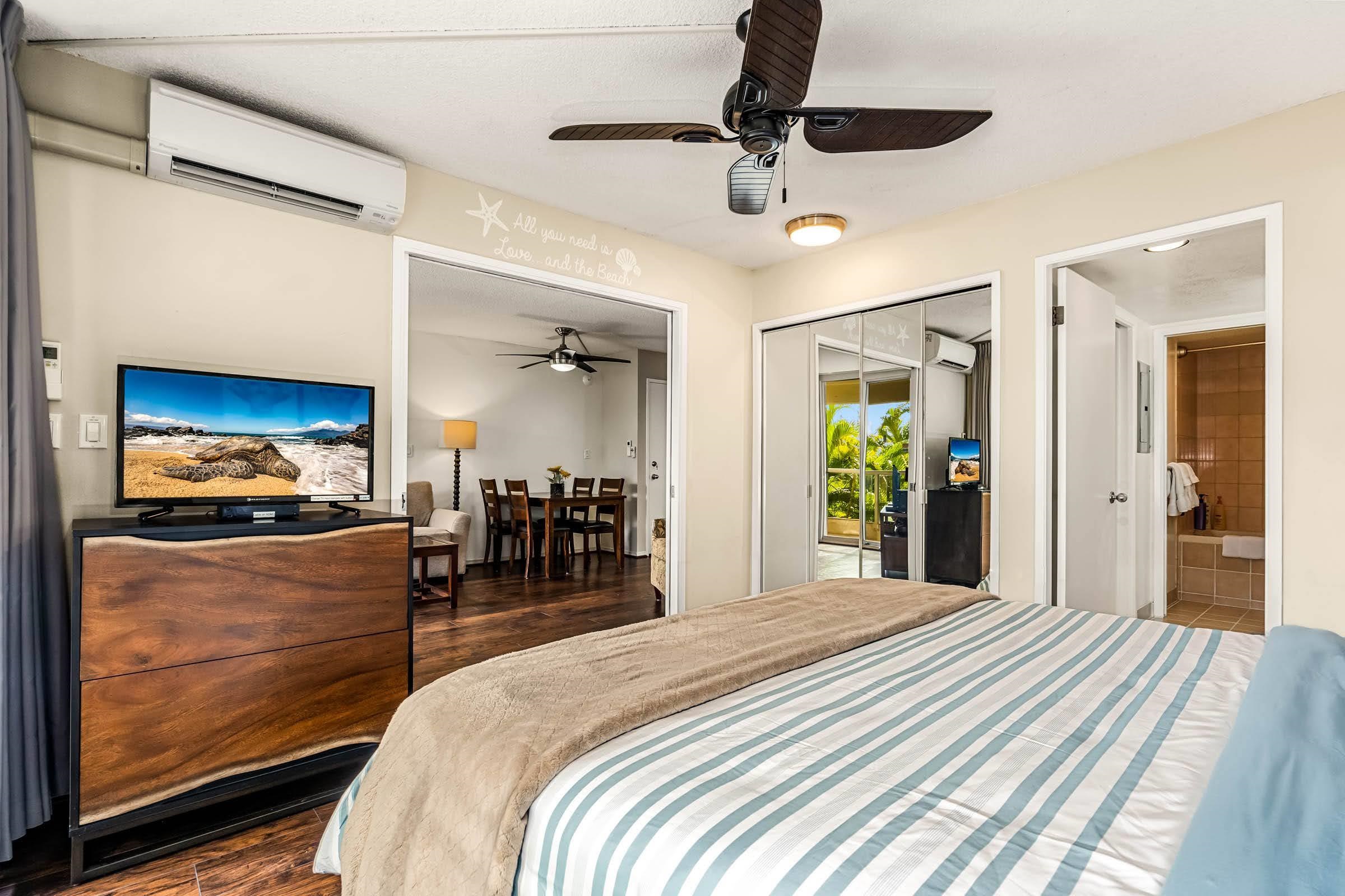 2575 South Kihei Road, Unit G209 Kihei, HI 96753 - Photo 13 of 27 a bedroom with furniture and a bed