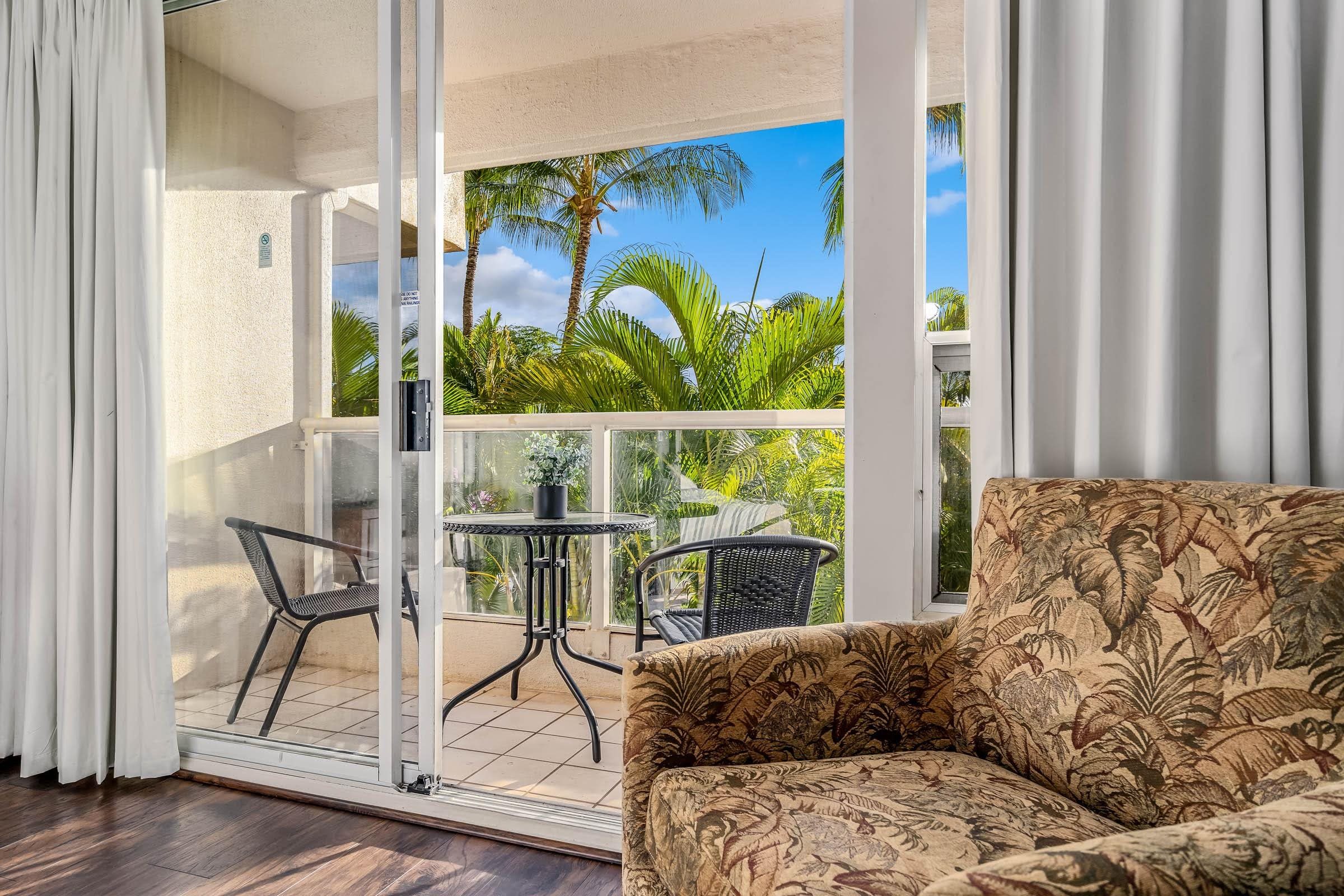 2575 South Kihei Road, Unit G209 Kihei, HI 96753 - Photo 20 of 27 a living room with furniture and wooden floor