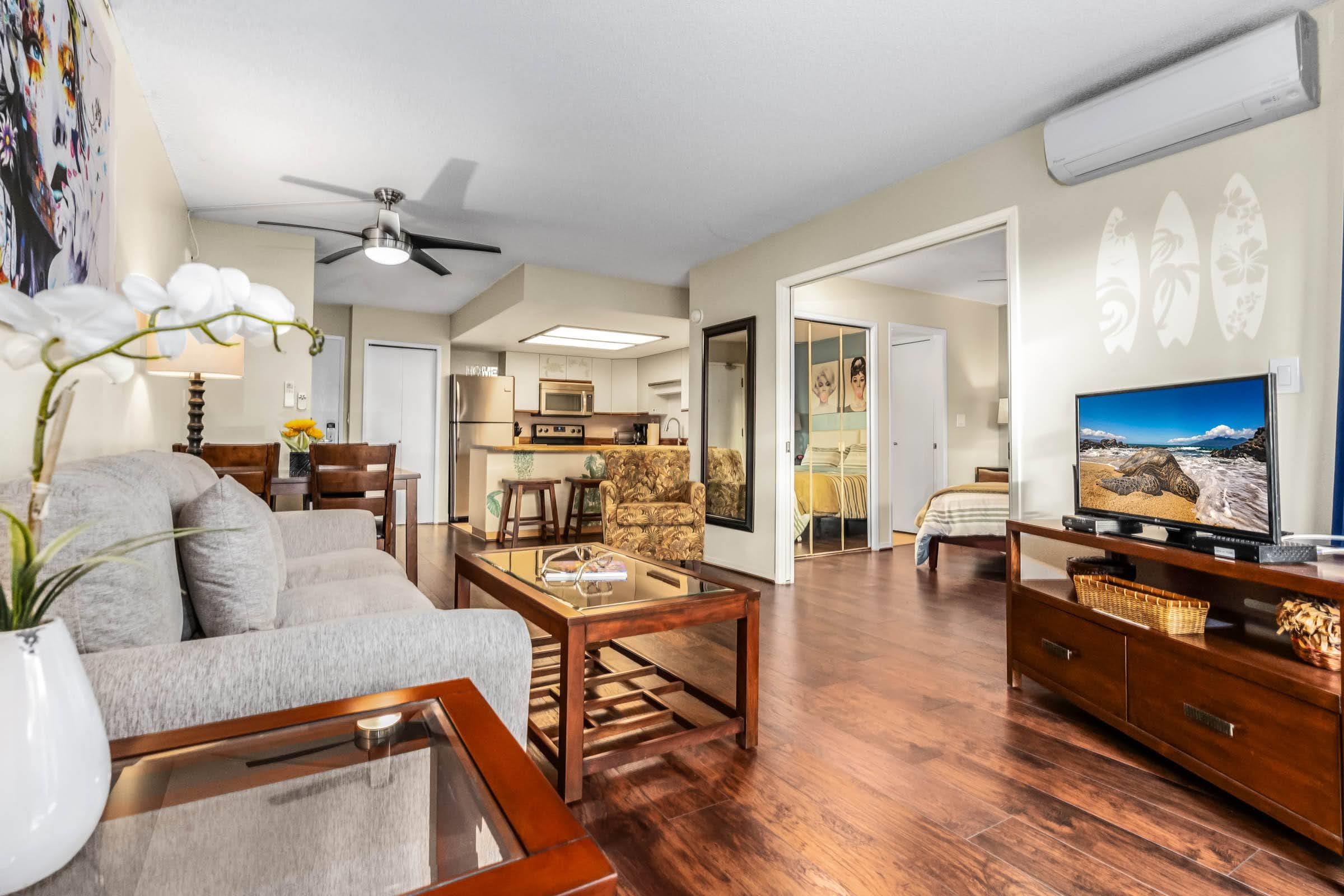 2575 South Kihei Road, Unit G209 Kihei, HI 96753 - Photo 22 of 27 a living room with furniture and a flat screen tv