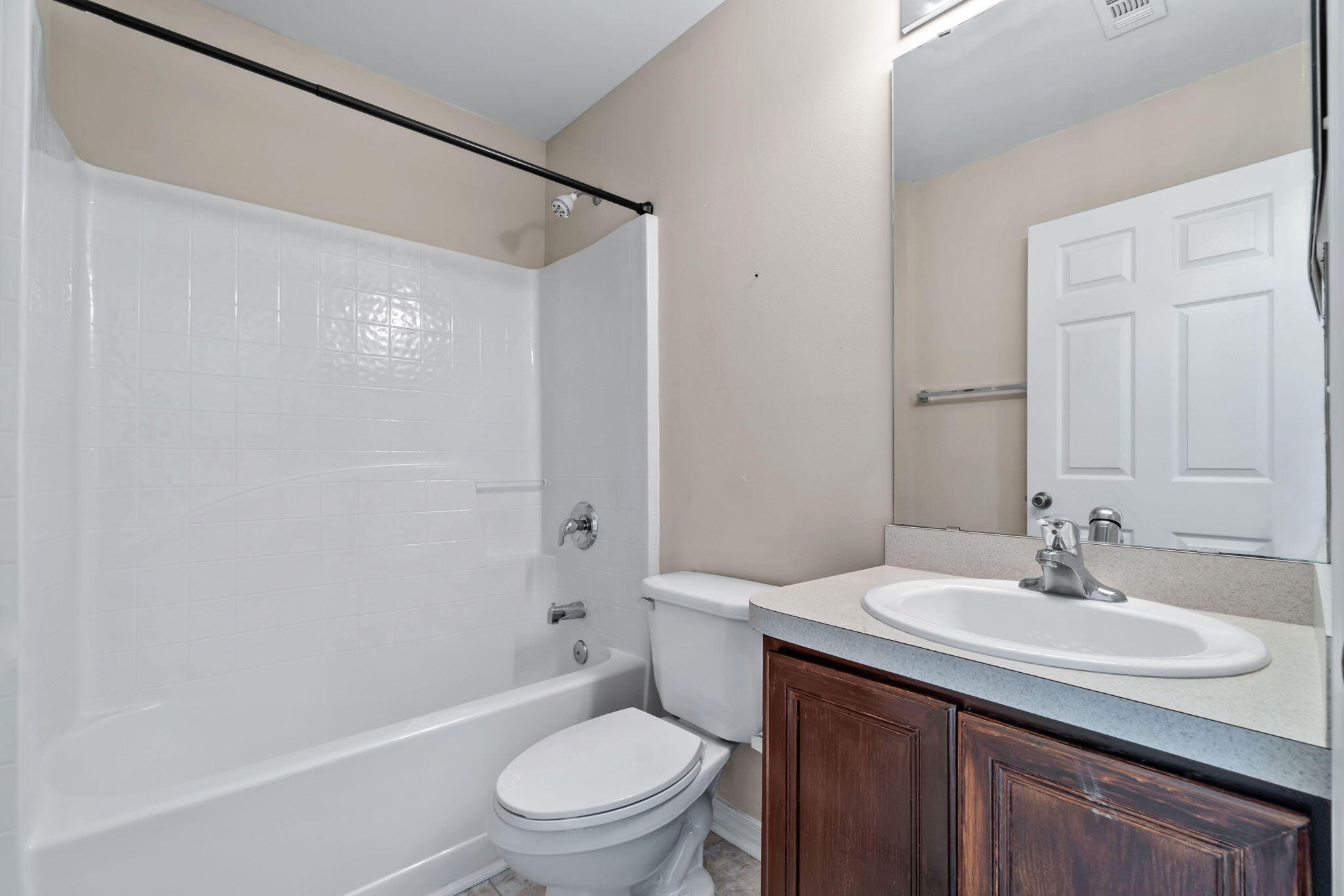 218 Cabana Way Crestview, FL 32536 - Photo 19 of 35 a bathroom with a sink toilet vanity and shower