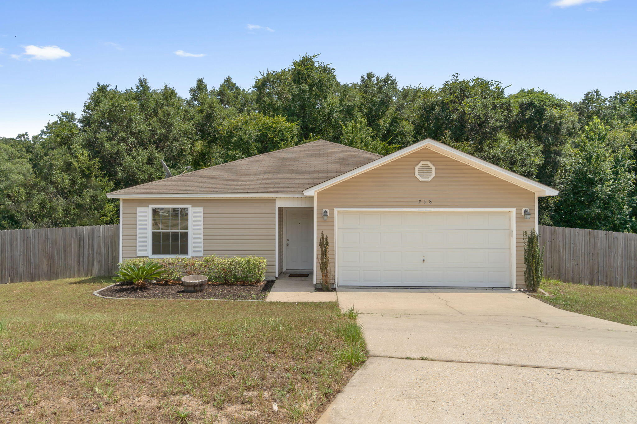 218 Cabana Way Crestview, FL 32536 - Photo 2 of 35 a front view of a house with garden