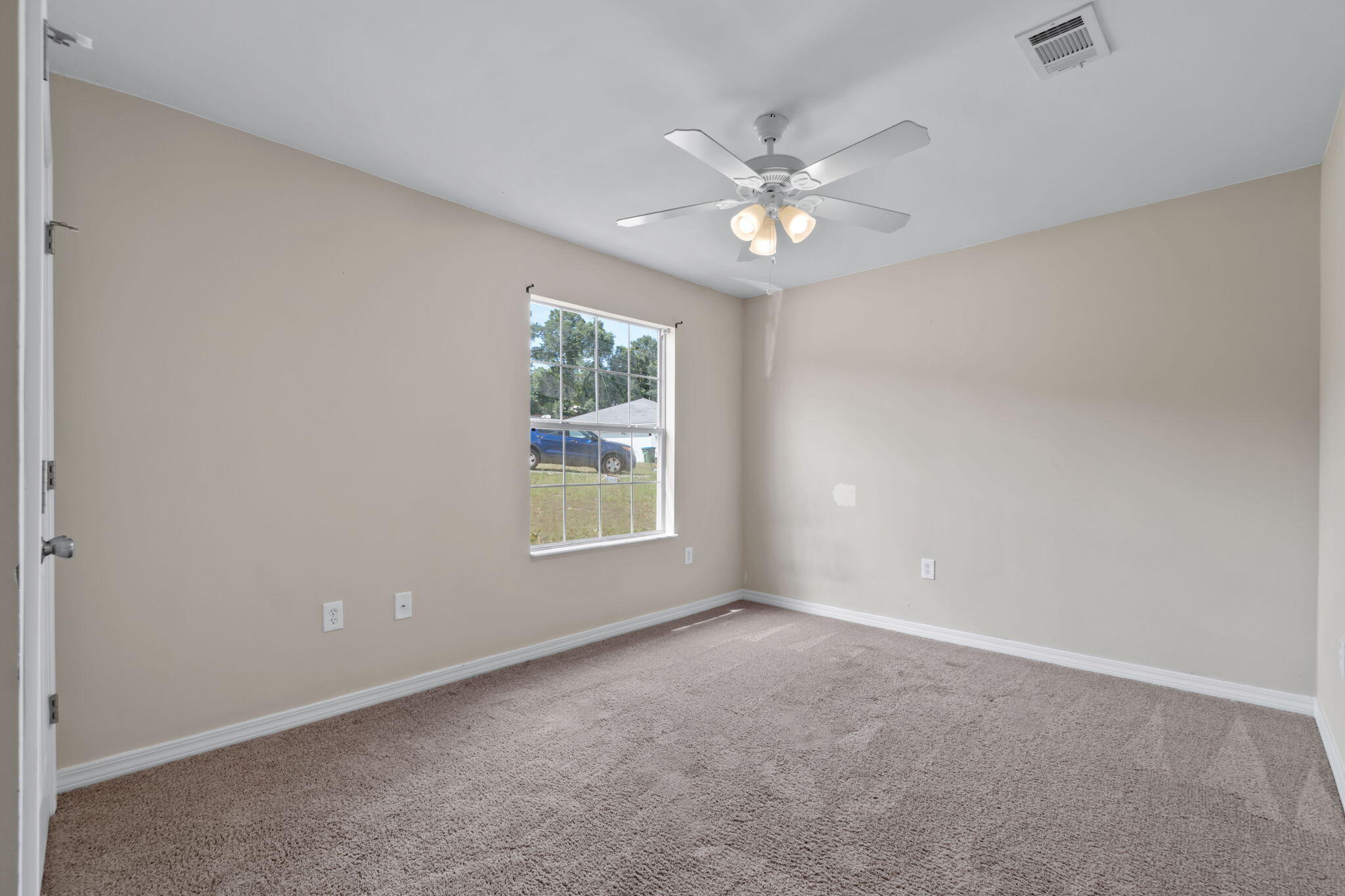 218 Cabana Way Crestview, FL 32536 - Photo 22 of 35 a view of an empty room with a window