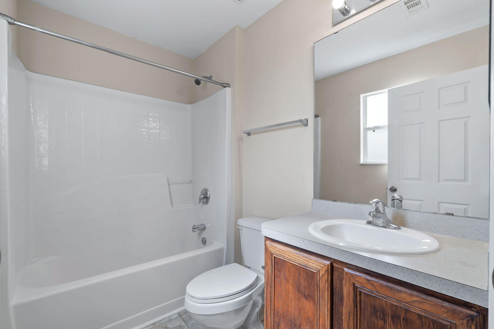 218 Cabana Way Crestview, FL 32536 - Photo 27 of 35 a bathroom with a granite countertop sink toilet and shower