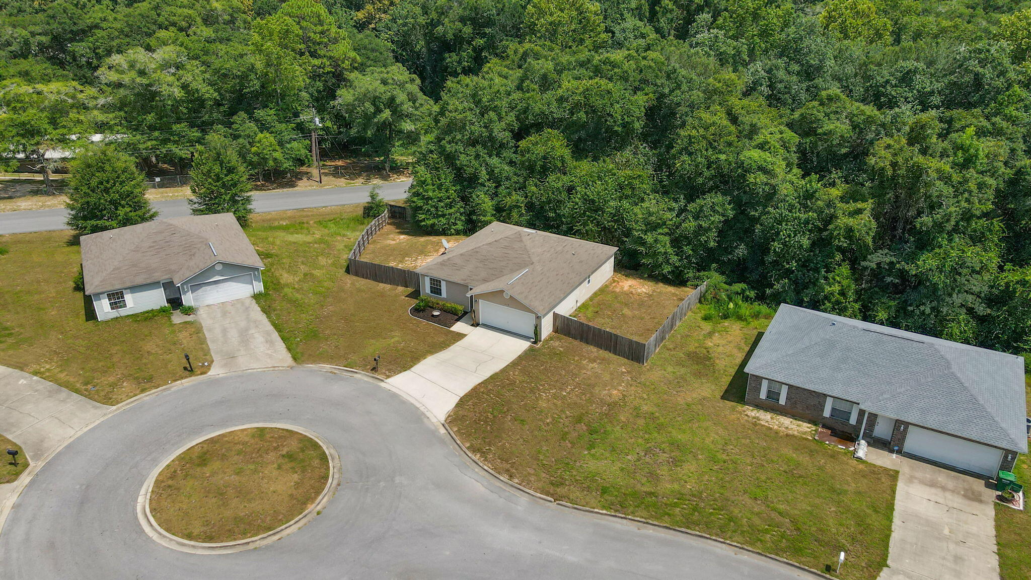 218 Cabana Way Crestview, FL 32536 - Photo 33 of 35 an aerial view of a house with swimming pool and yard