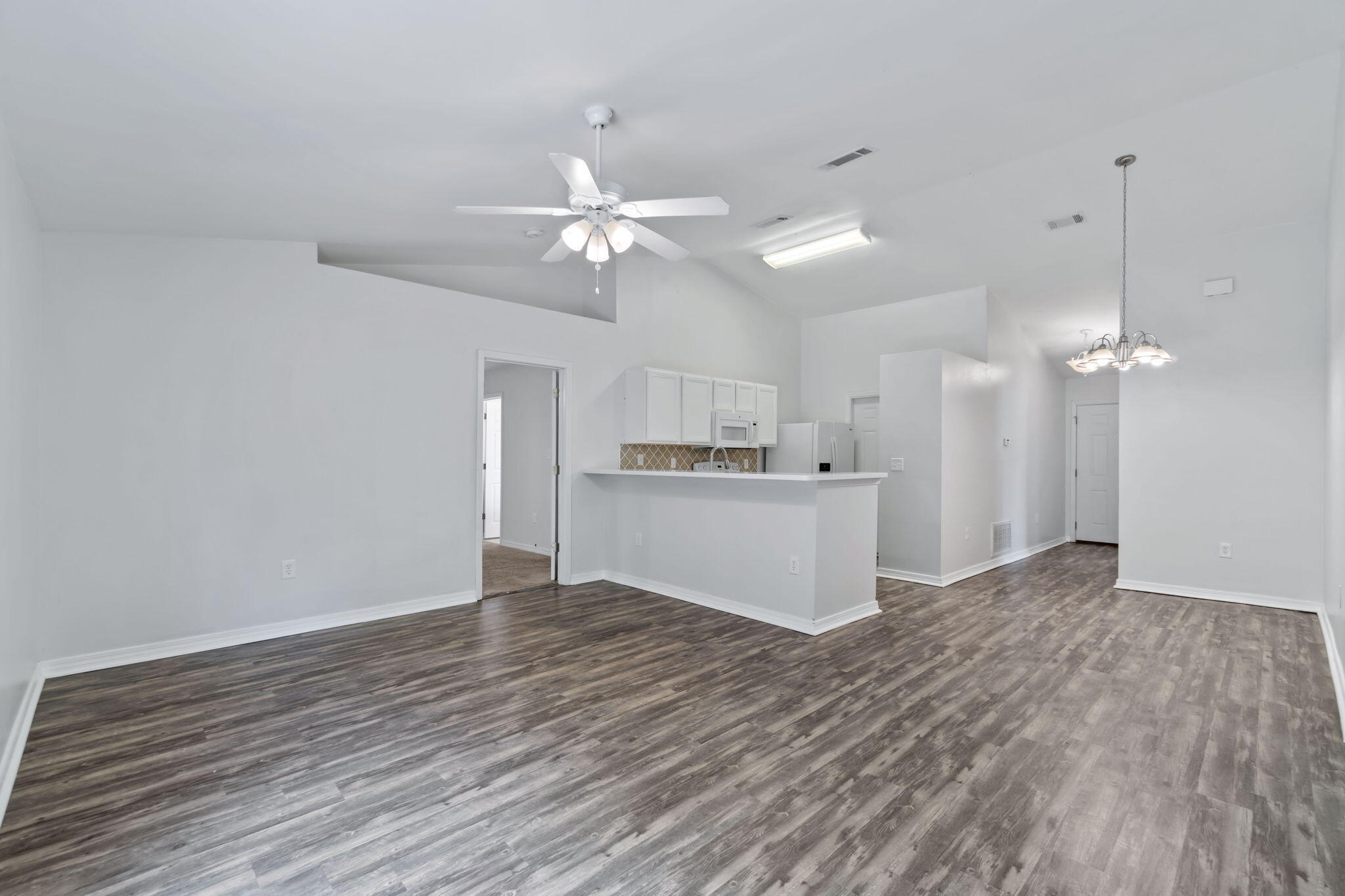 218 Cabana Way Crestview, FL 32536 - Photo 7 of 35 a view of a kitchen with marble kitchen and kitchen appliances