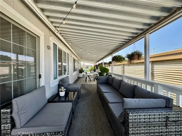 a balcony with furniture