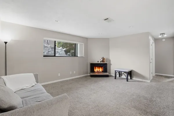 a living room with furniture and a couch