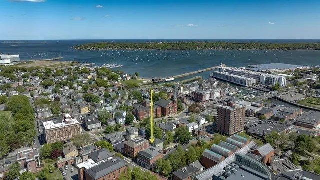 a view of a lake with a city