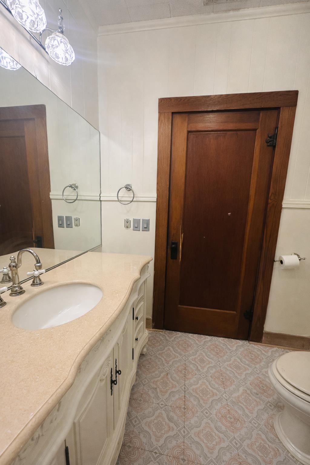 206 East Sandstone Street Llano, TX 78643 - Photo 15 of 16 a bathroom with a sink a toilet and shower