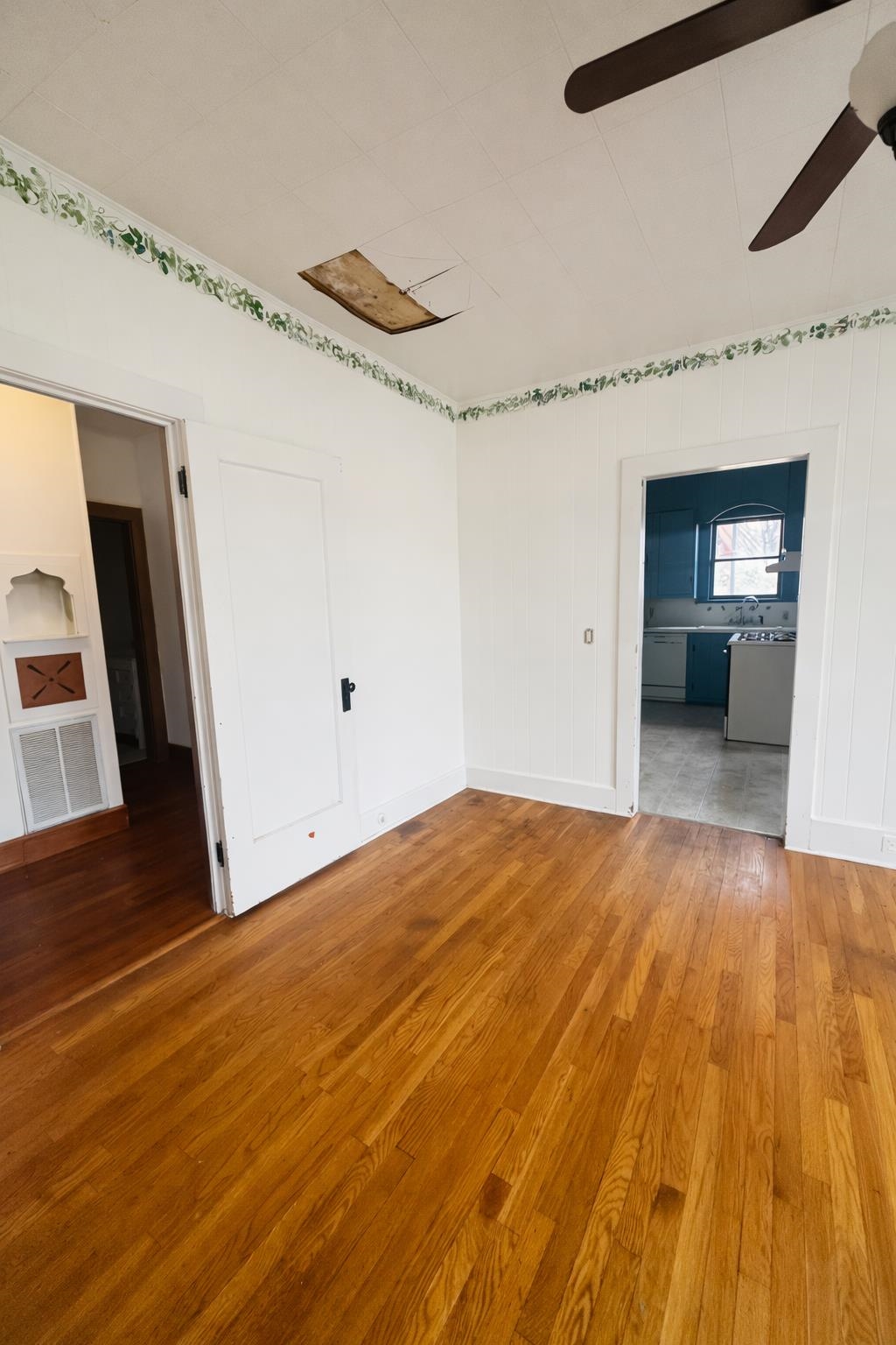 206 East Sandstone Street Llano, TX 78643 - Photo 6 of 16 a view of empty room with wooden floor