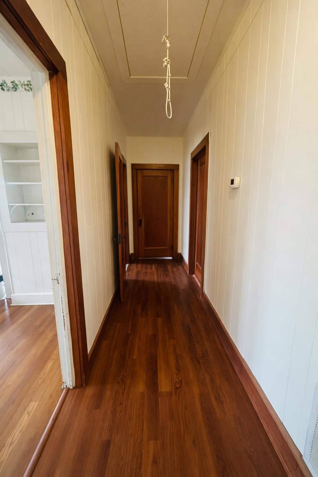 206 East Sandstone Street Llano, TX 78643 - Photo 10 of 16 a view of gallery with wooden floor