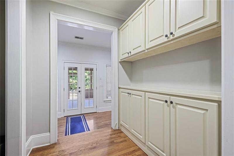 1665 Cunningham Road Southwest Marietta, GA 30008 - Photo 11 of 36 a view of a closet area with wooden floor