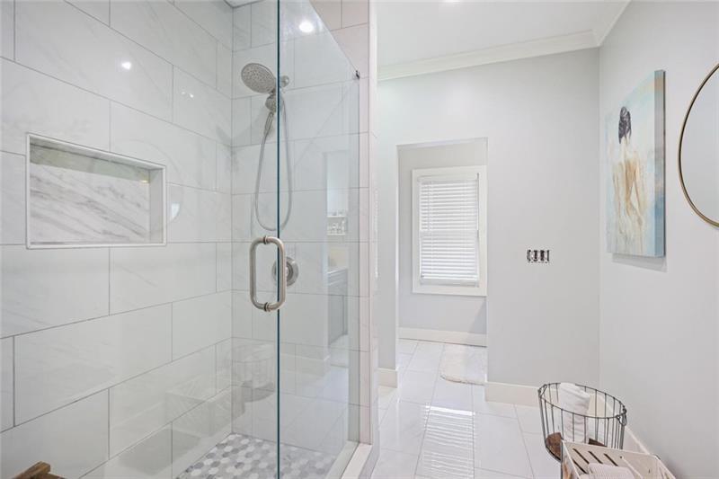 1665 Cunningham Road Southwest Marietta, GA 30008 - Photo 17 of 36 a bathroom with a shower