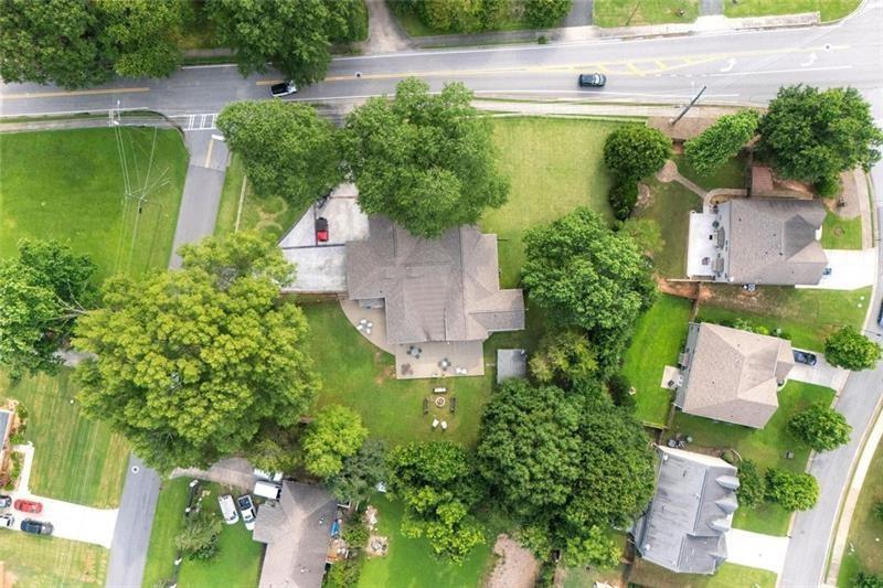 1665 Cunningham Road Southwest Marietta, GA 30008 - Photo 26 of 36 an aerial view of a house with a garden