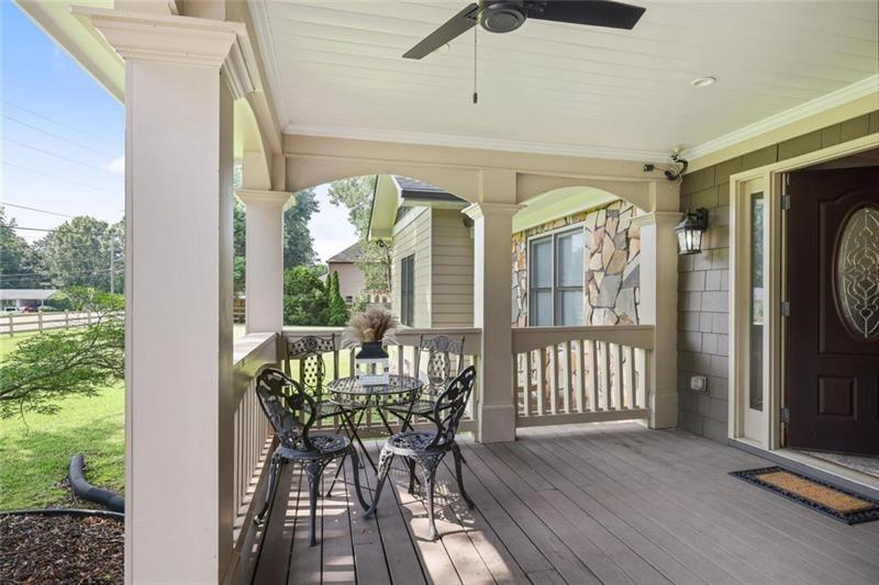 1665 Cunningham Road Southwest Marietta, GA 30008 - Photo 3 of 36 a view of a dining room with furniture window and outside view