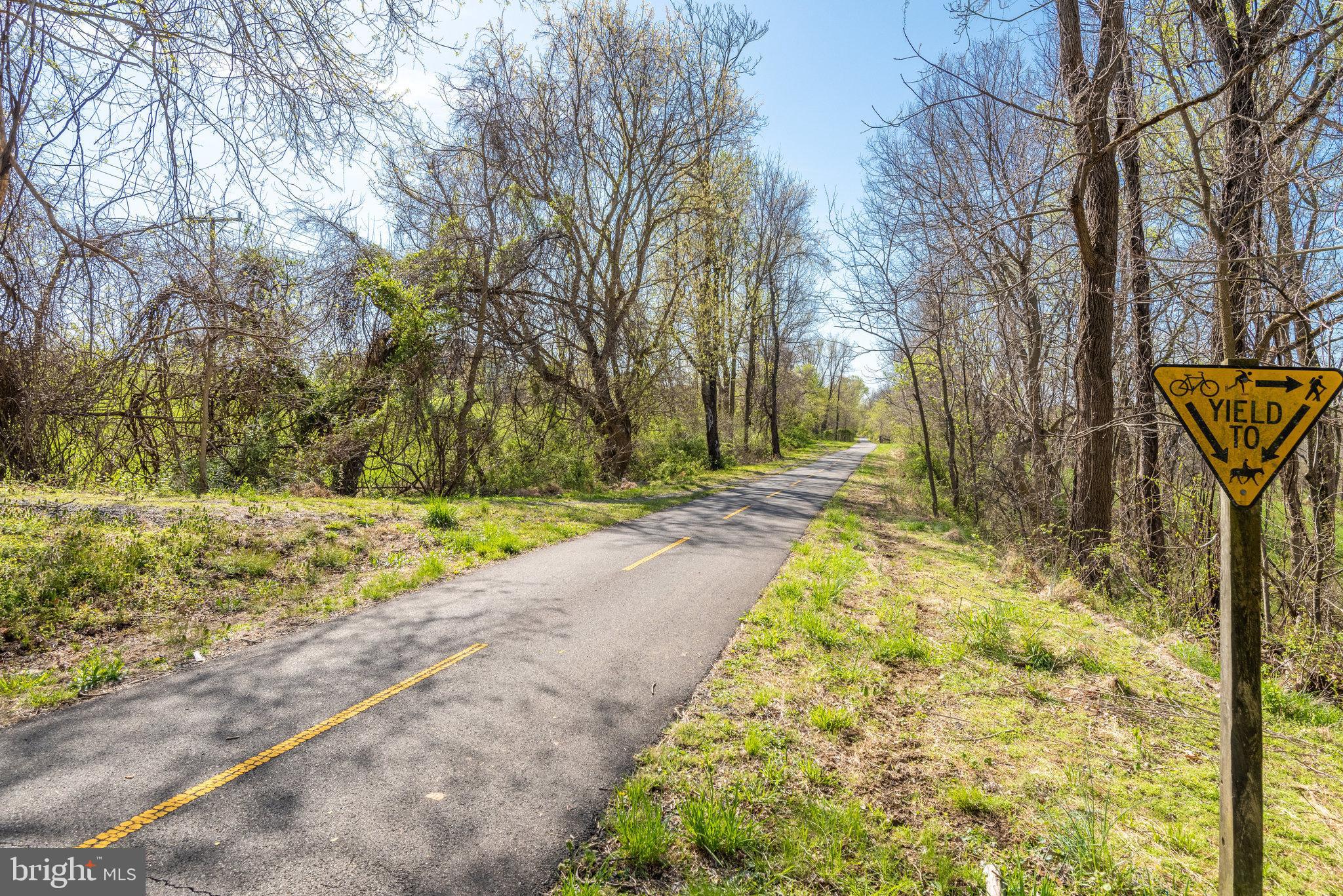 17890 Dry Mill Road Leesburg, VA 20175 - Photo 24 of 73 The bike trail runs behind the home, down below.