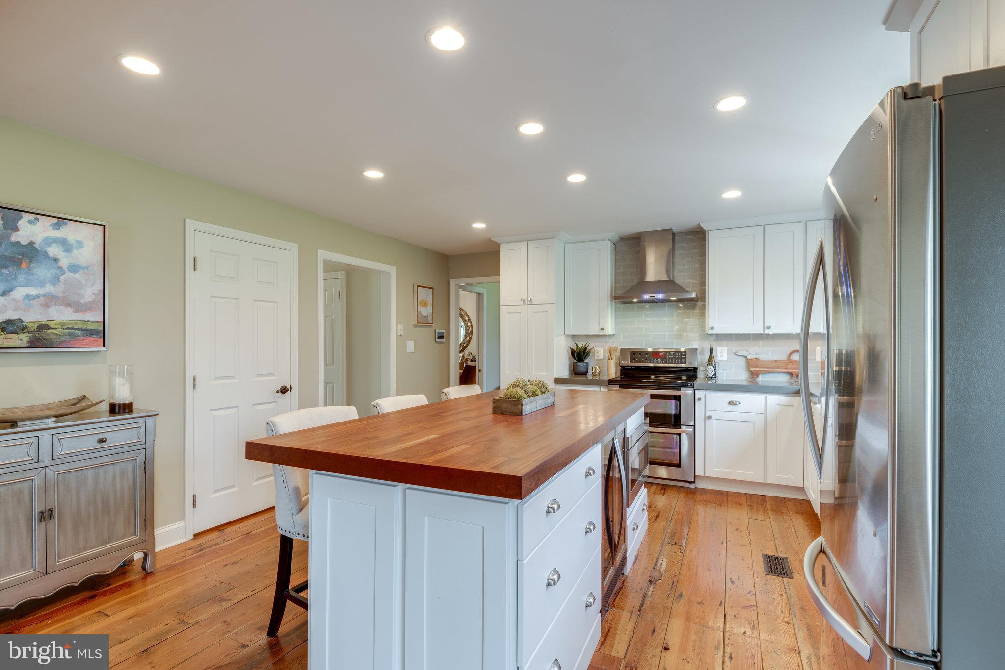 17890 Dry Mill Road Leesburg, VA 20175 - Photo 31 of 73 The island holds the beverage refrigerator