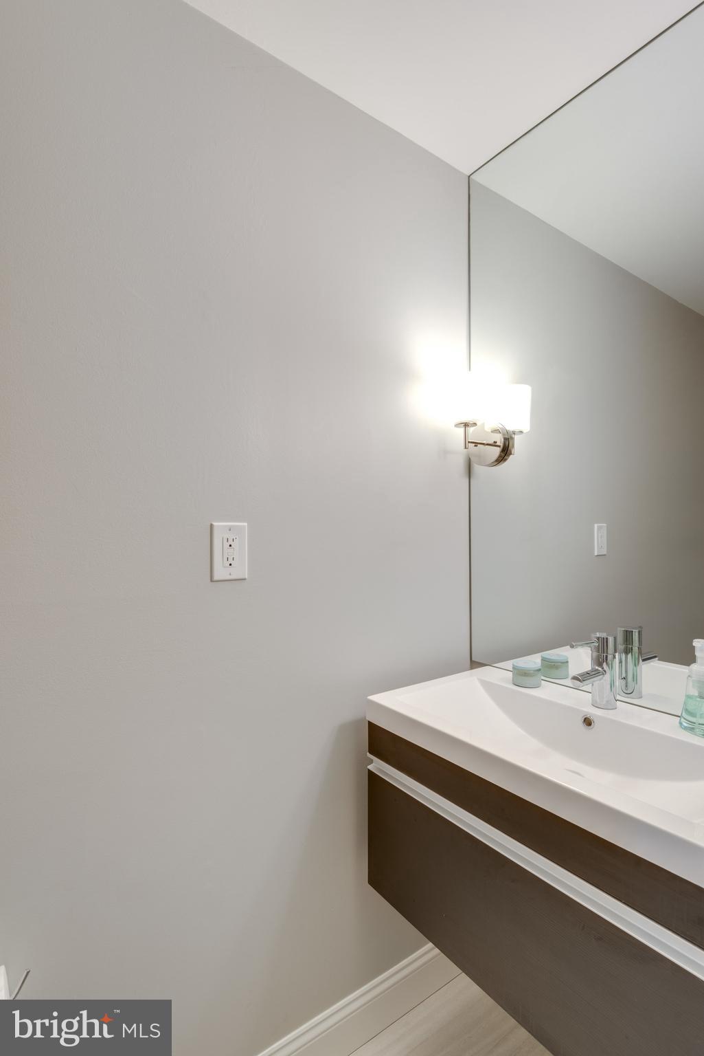 17890 Dry Mill Road Leesburg, VA 20175 - Photo 39 of 73 The powder room on the main level is updated