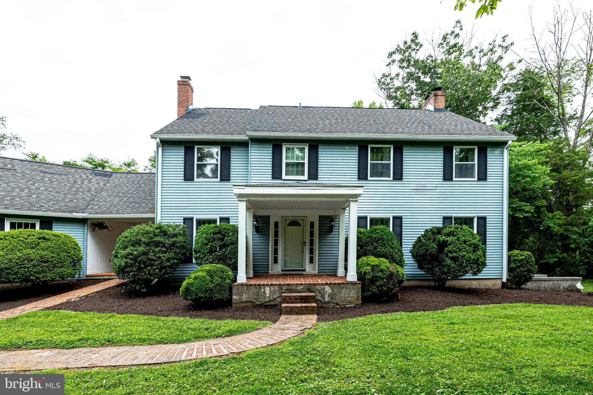 A covered front porch is welcoming to your guests