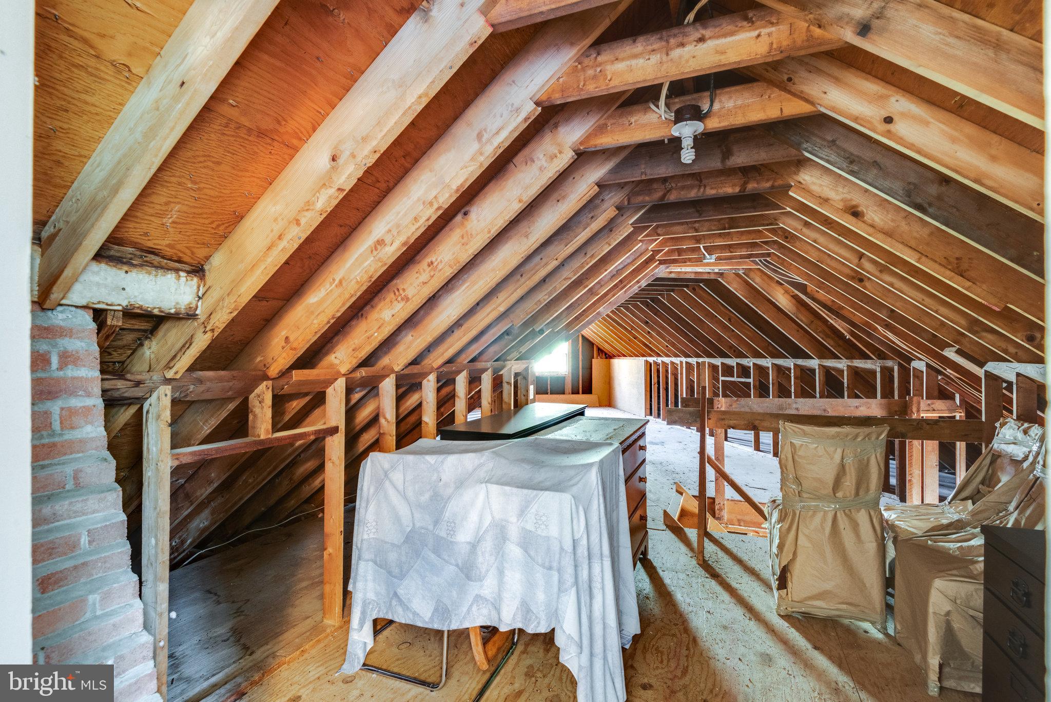 17890 Dry Mill Road Leesburg, VA 20175 - Photo 59 of 73 This walk in attic space is huge w/stairs.