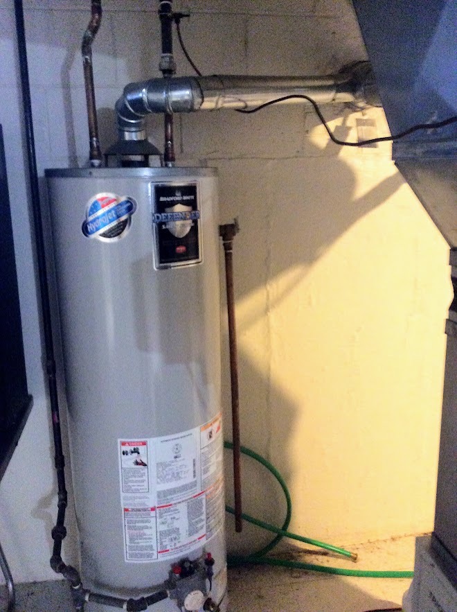 Undisclosed Address North Riverside, IL 60546 - Photo 12 of 12 a picture of water heater room