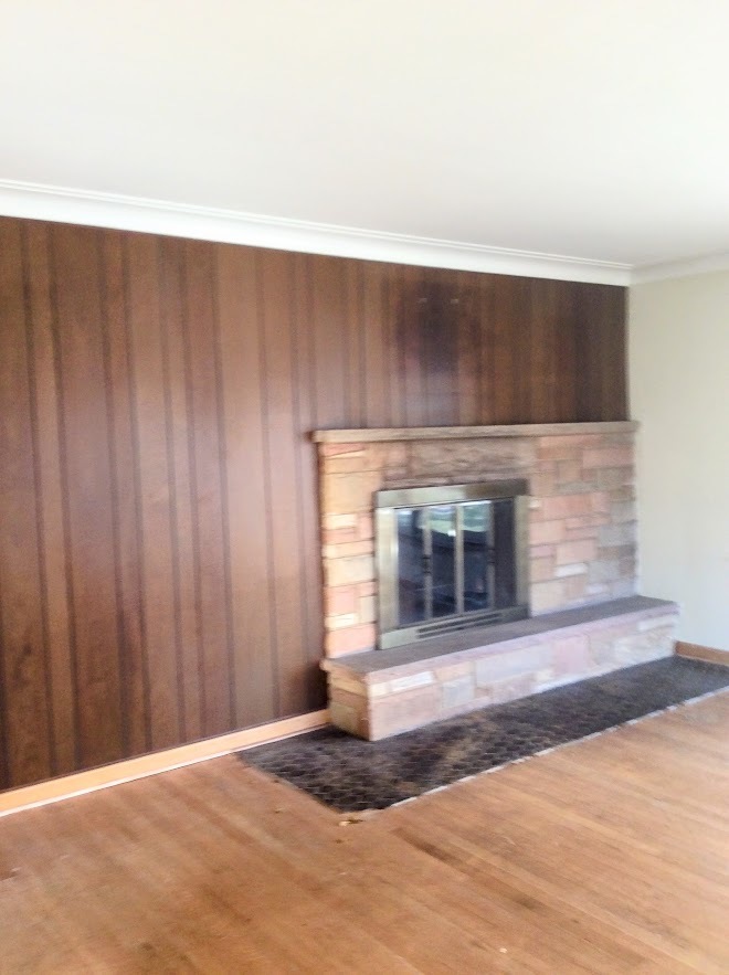 Undisclosed Address North Riverside, IL 60546 - Photo 3 of 12 a living room with a fireplace