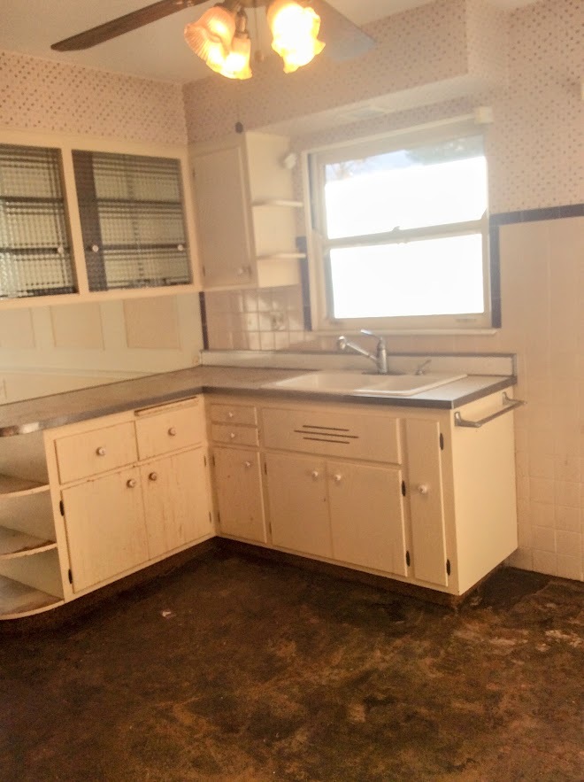 Undisclosed Address North Riverside, IL 60546 - Photo 5 of 12 view of kitchen with granite countertop cabinets and window