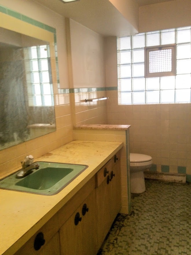 Undisclosed Address North Riverside, IL 60546 - Photo 8 of 12 a bathroom with a sink and a toilet