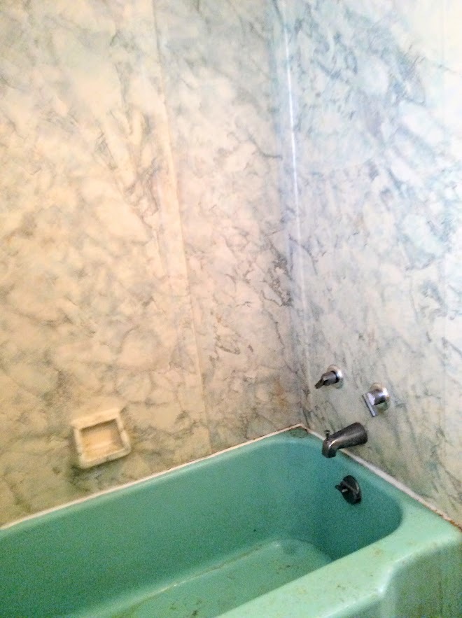 Undisclosed Address North Riverside, IL 60546 - Photo 9 of 12 a bathroom with a sink and a shower