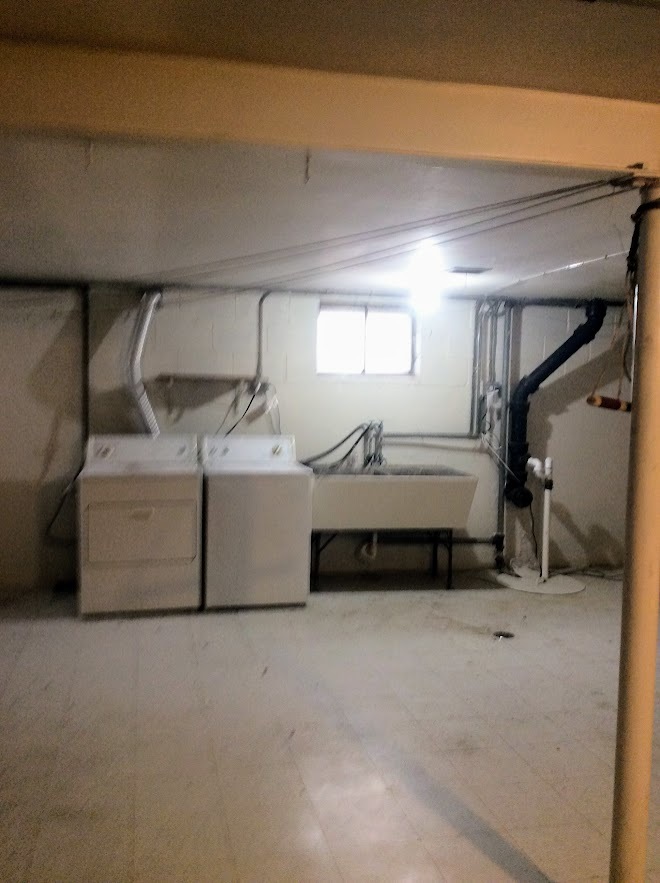 Undisclosed Address North Riverside, IL 60546 - Photo 10 of 12 a bedroom with a bed and a window