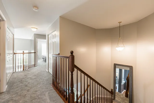 a view of a hallway with entryway