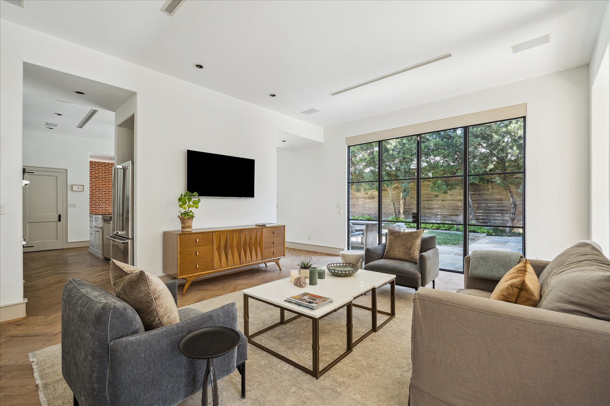 1807 Albans Road Houston, TX 77005 - Photo 11 of 39 a living room with furniture and a flat screen tv