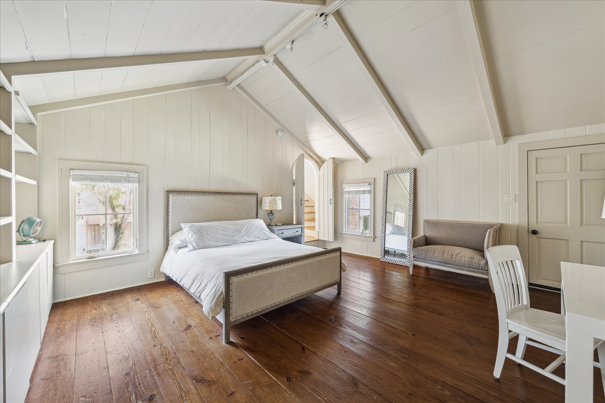 1807 Albans Road Houston, TX 77005 - Photo 19 of 39 a spacious bedroom with a bed couch and a window