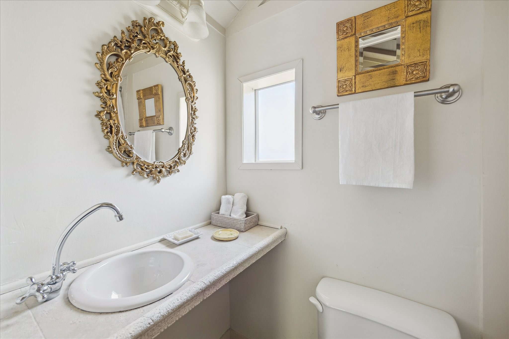 1807 Albans Road Houston, TX 77005 - Photo 20 of 39 a bathroom with a toilet sink and mirror