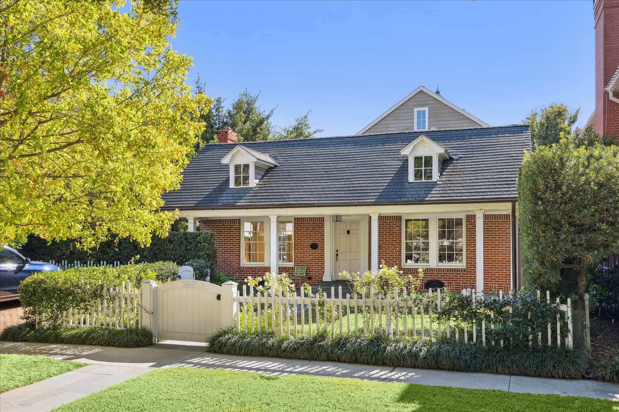 1807 Albans Road Houston, TX 77005 - Photo 2 of 39 front view of a house with a yard
