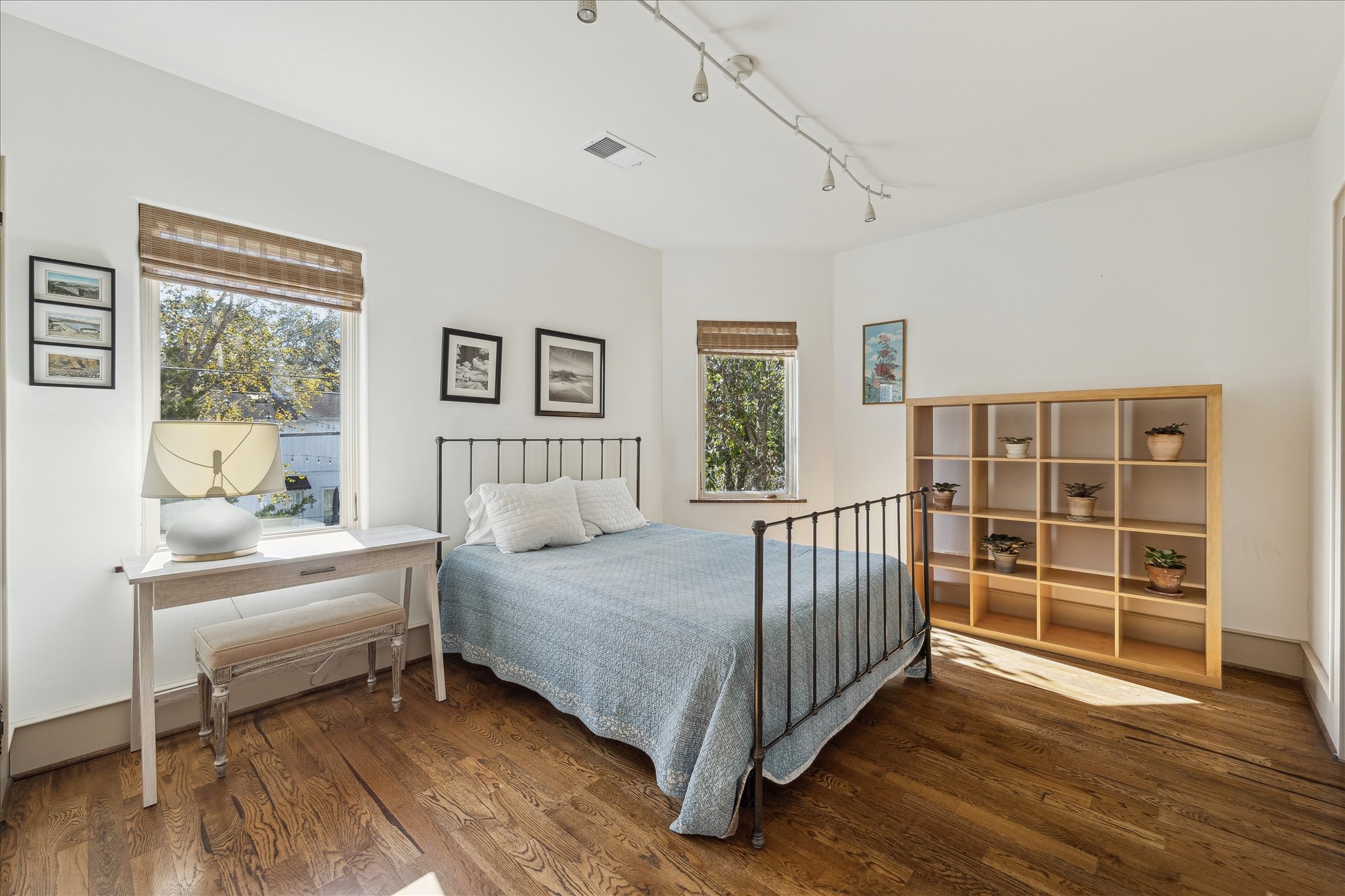 1807 Albans Road Houston, TX 77005 - Photo 22 of 39 a bedroom with a bed and a window