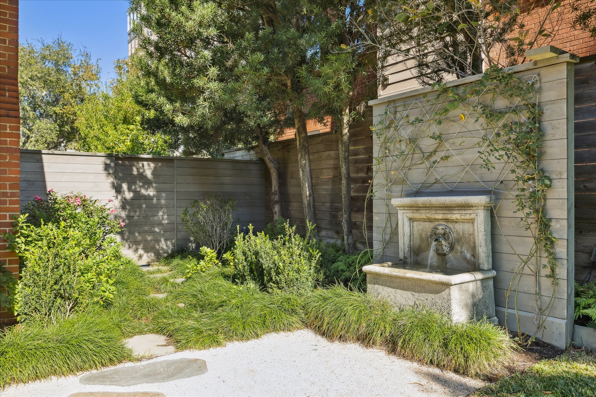 1807 Albans Road Houston, TX 77005 - Photo 29 of 39 a front view of a house with garden