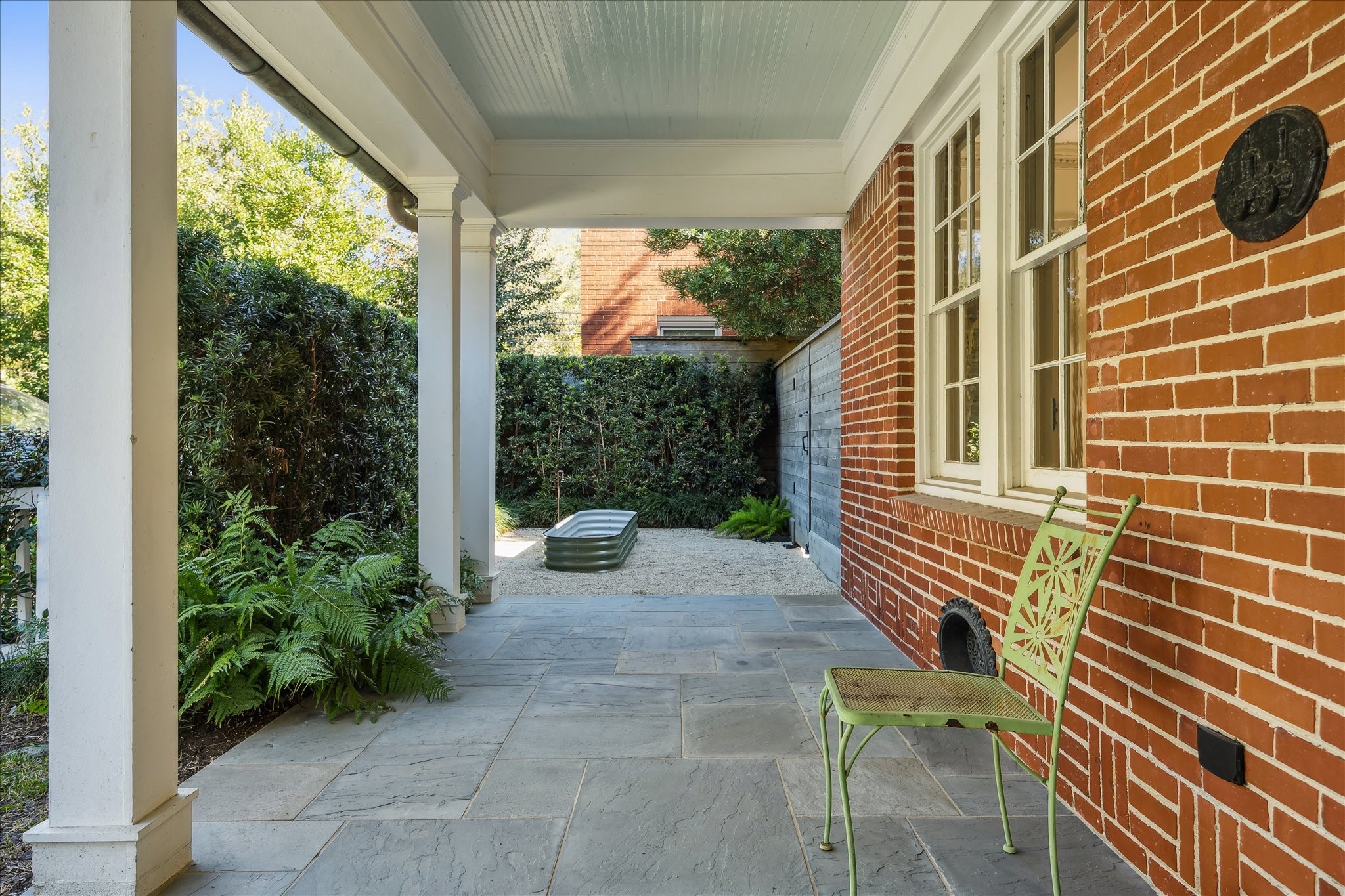 1807 Albans Road Houston, TX 77005 - Photo 3 of 39 a view of a patio with table and chairs and potted plants