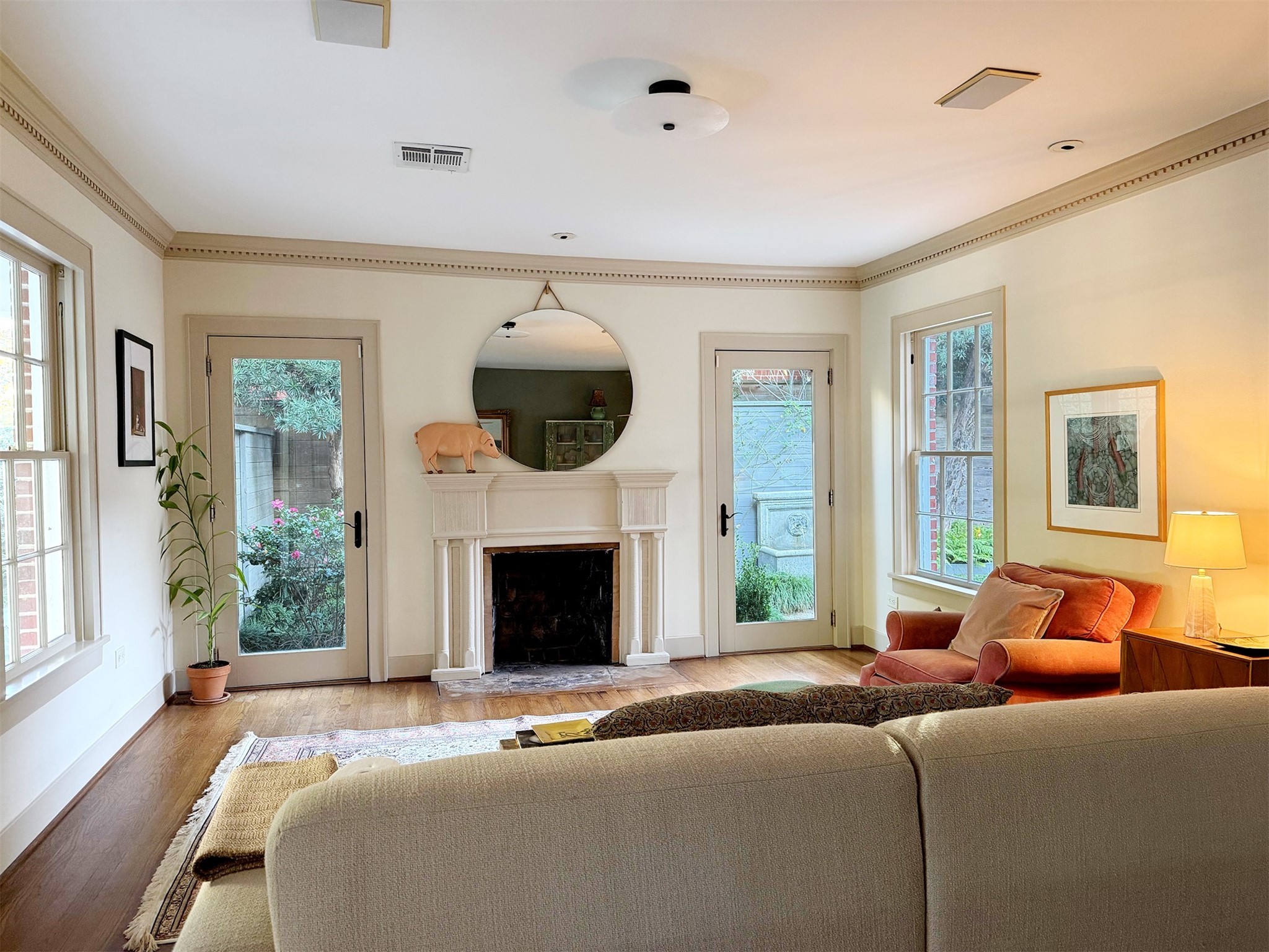 1807 Albans Road Houston, TX 77005 - Photo 33 of 39 a spacious bedroom with a balcony a bed furniture and a fireplace
