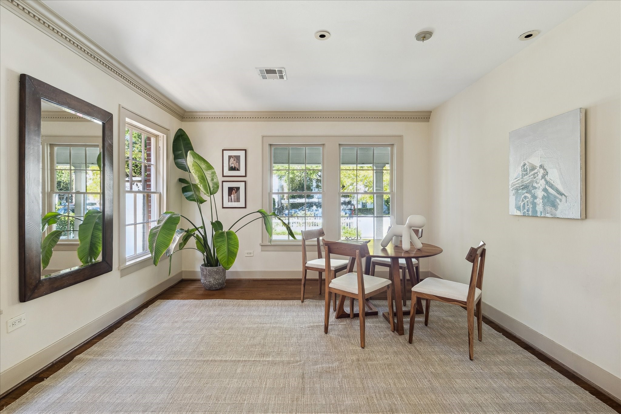1807 Albans Road Houston, TX 77005 - Photo 5 of 39 a living room with furniture and a floor to ceiling window