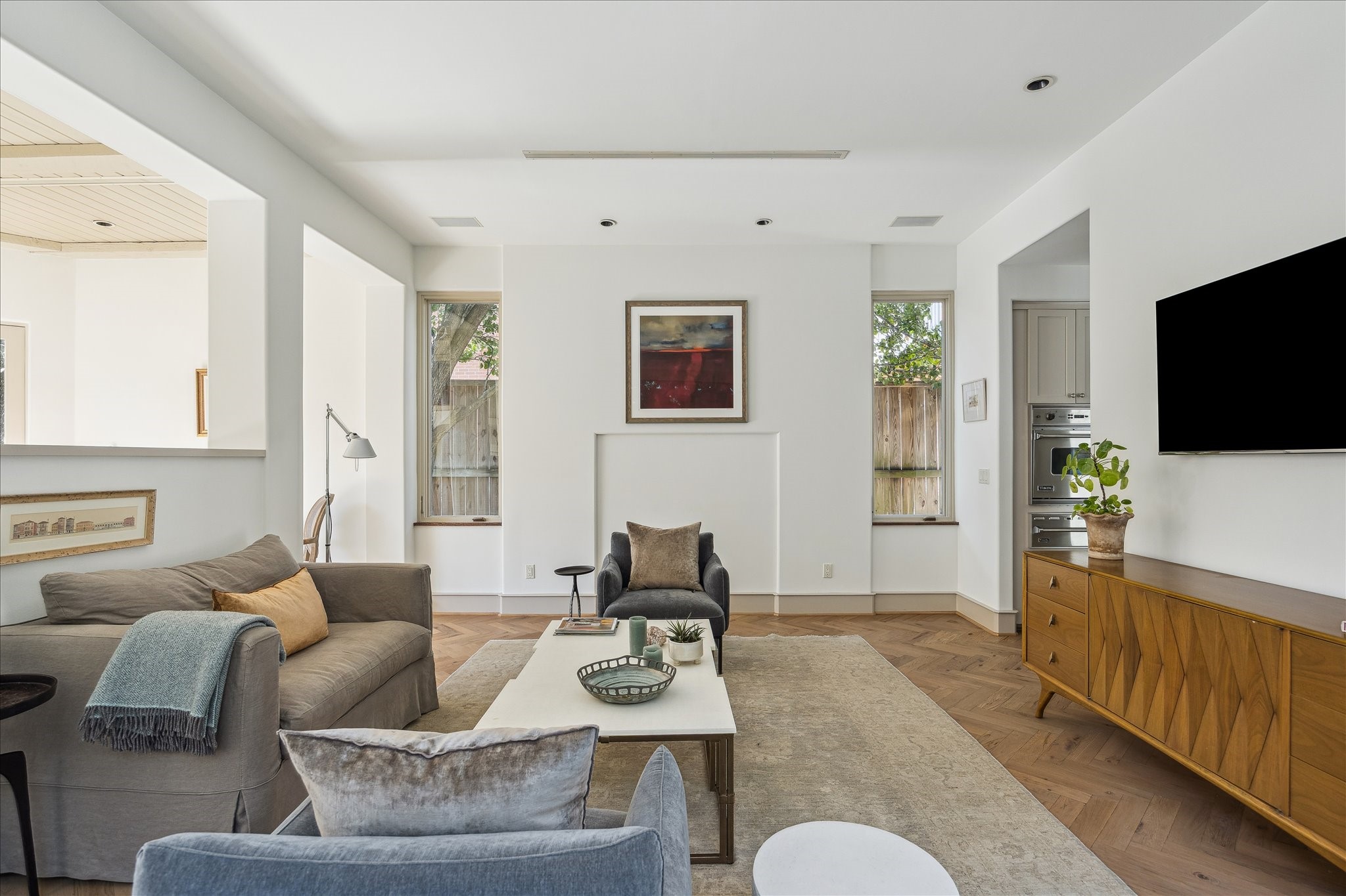 1807 Albans Road Houston, TX 77005 - Photo 10 of 39 a living room with furniture and a flat screen tv